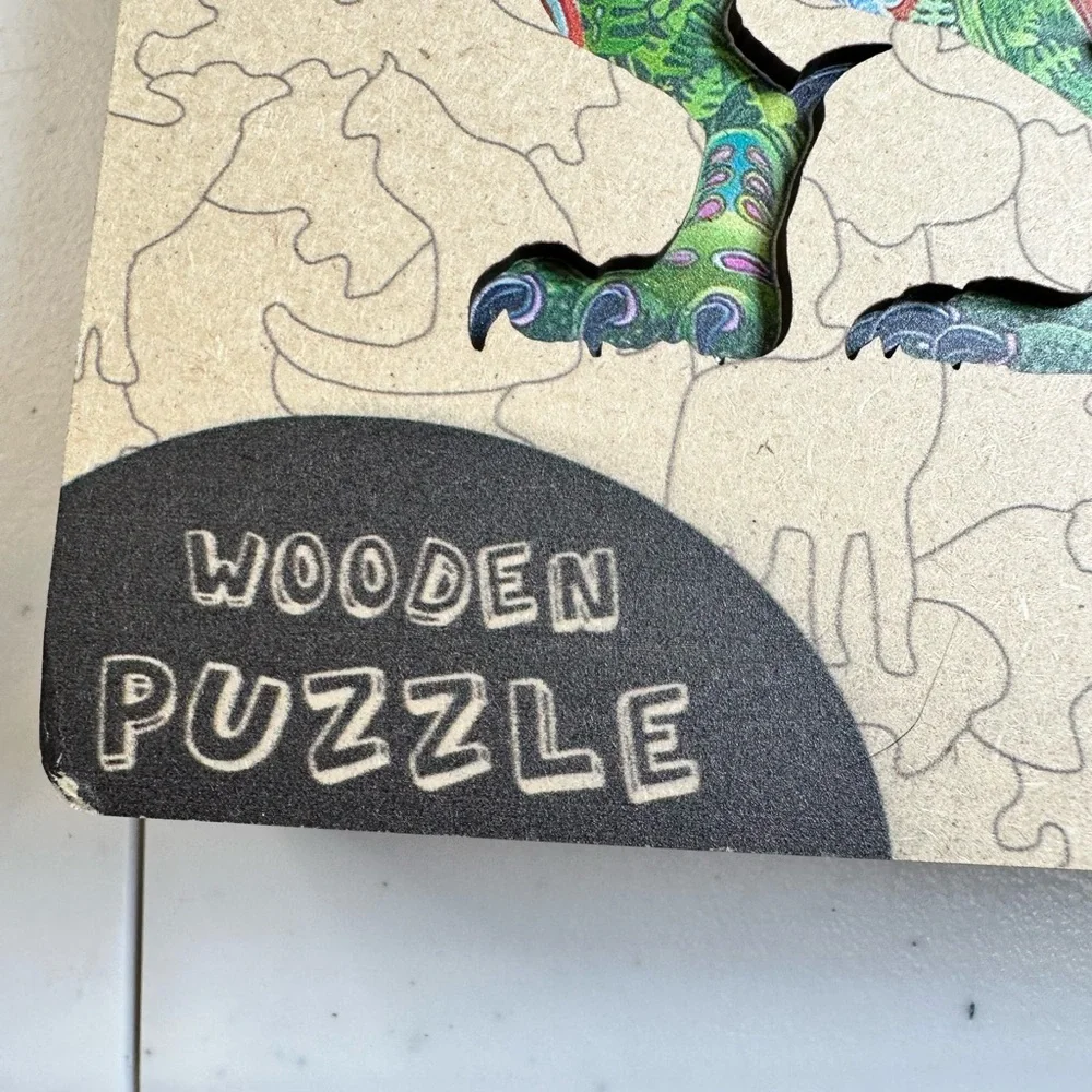 NIB QuordlePuzzles Colorful Dinosaur Wooden Puzzle - Size Medium